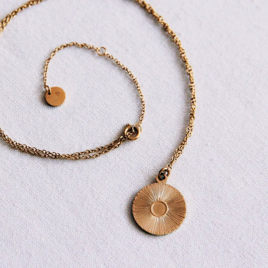 Gouden ketting met ronde fantasie bedel