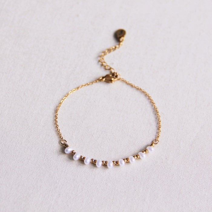 Goudkleurig armbandje met parels