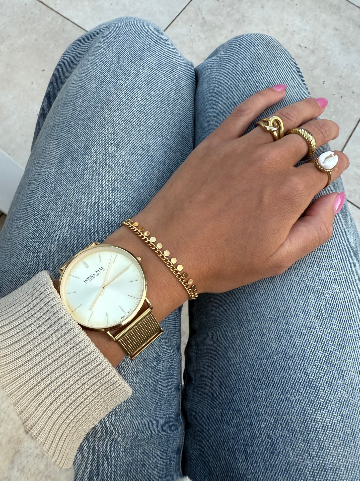 Gouden armband met muntjes