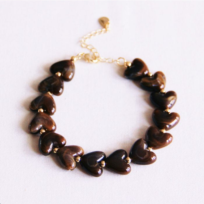 Armband hartjes bruin
