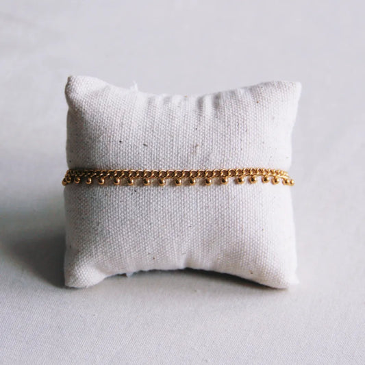 Gouden armband met balletjes