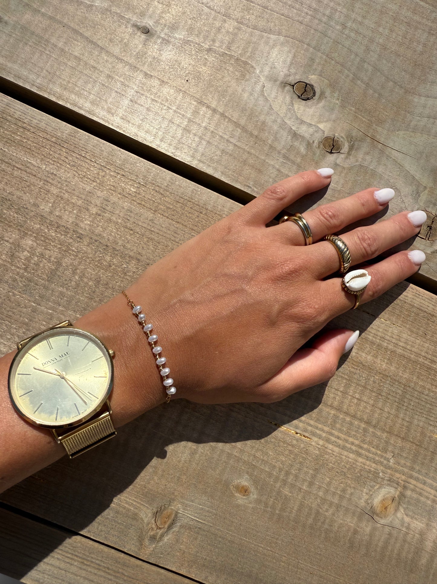 Goudkleurig armbandje met parels